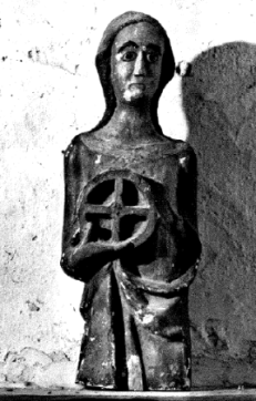 photo de la statue de la 
                                                      martyre St Catherine et 
                                                      sa croix